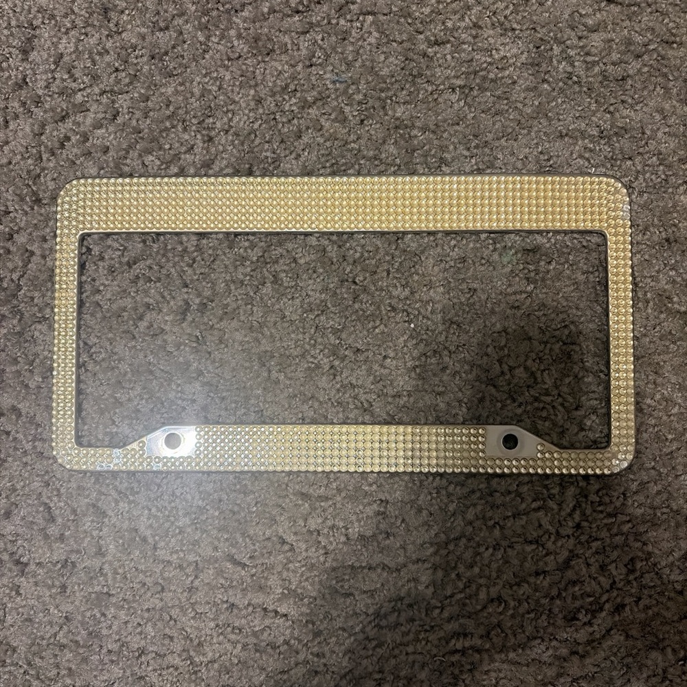 Gold license plate cover